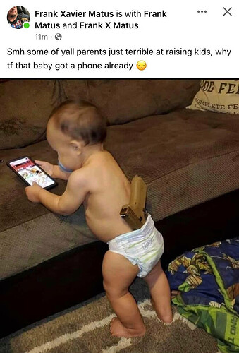 baby with gun in diaper