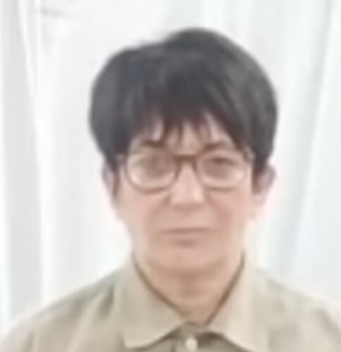 blurry_portrait_of_a_person_wearing_glasses