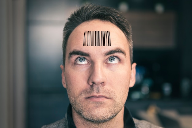 young-man-with-qr-code-his-forehead-man-with-stupid-expression-looks-his-qr-code-his-head-concept-chipping-population-global-control-governance_431724-218