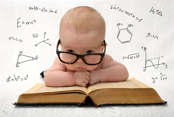 depositphotos_70342965-stock-photo-little-baby-in-glasses-with